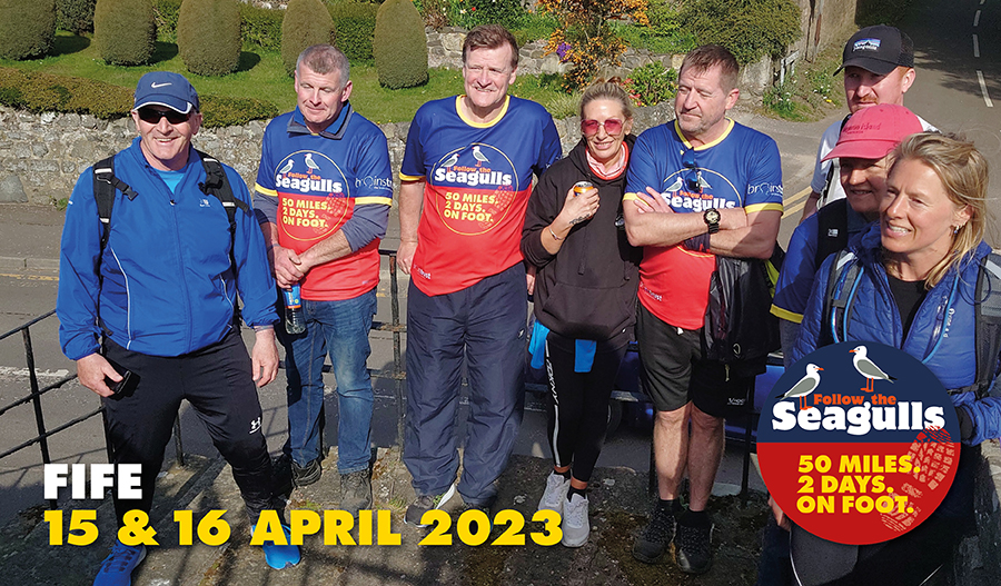 Text reads: Follow the Seagulls 2023 Fife, 15 and 16 April. ID: group of people in follow the seagulls t-shirts smiling 